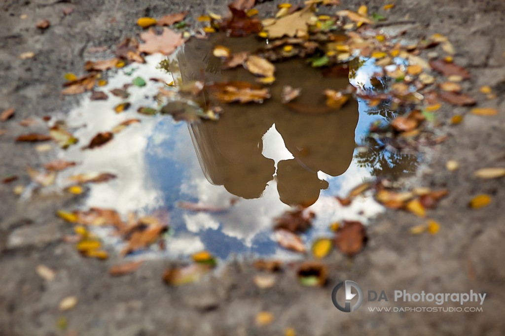 Wedding couple in round paddle reflection - by DA Photography at Black Creek Pioneer Village, www.daphotostudio.com