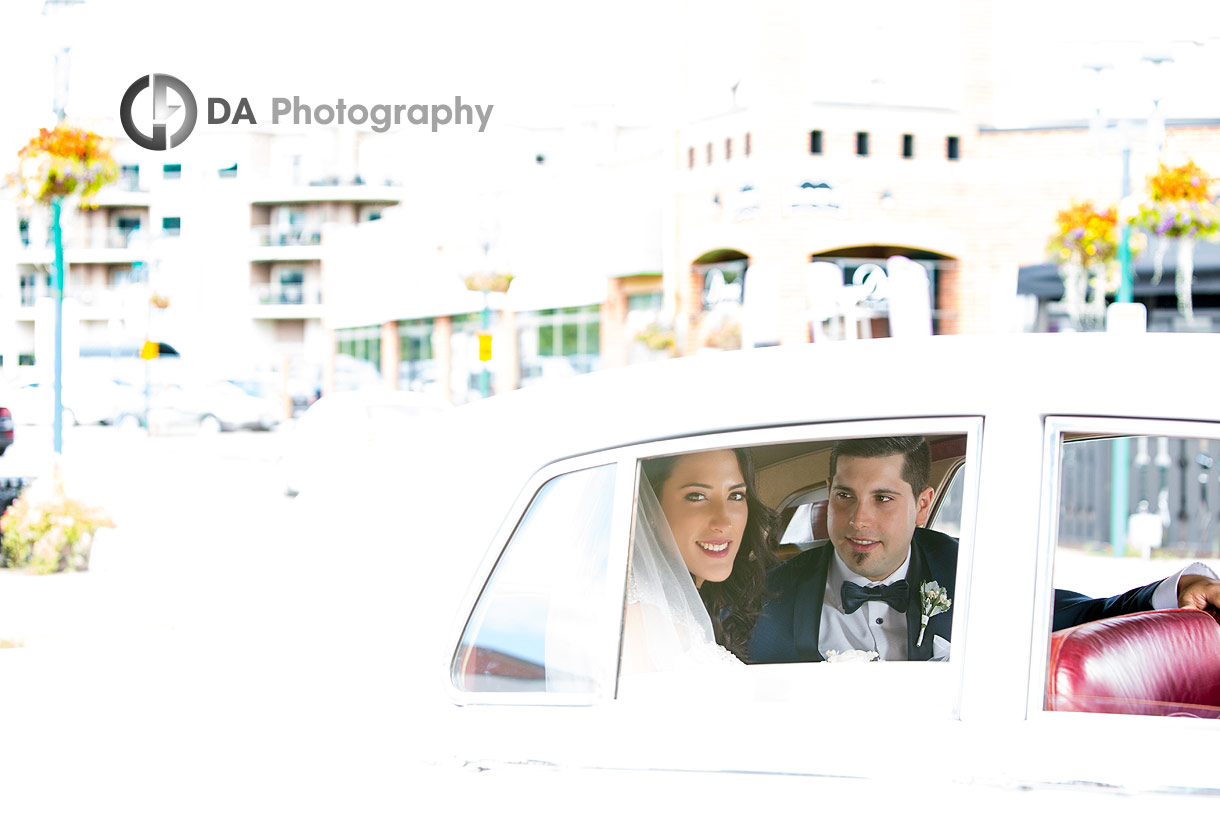 Bride and Groom in a vintage Car