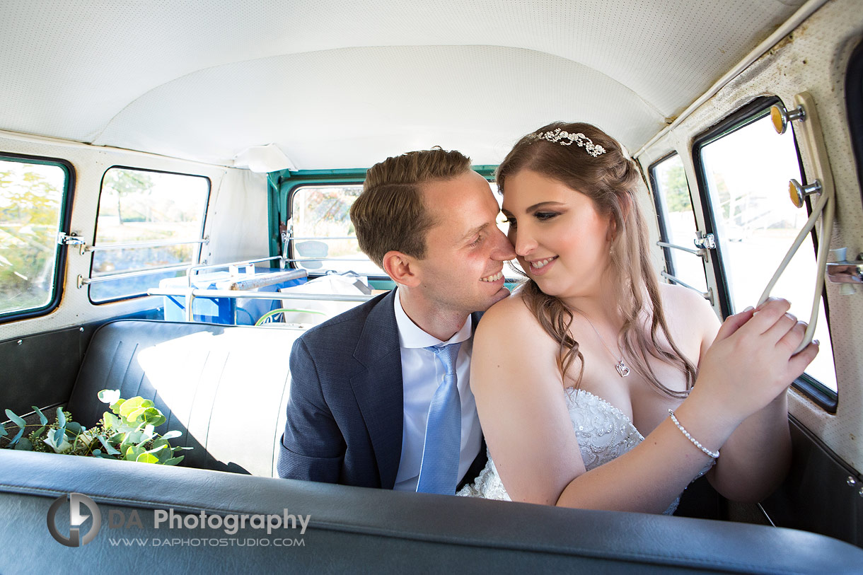 Bride and Groom in vintage Volkswagen van