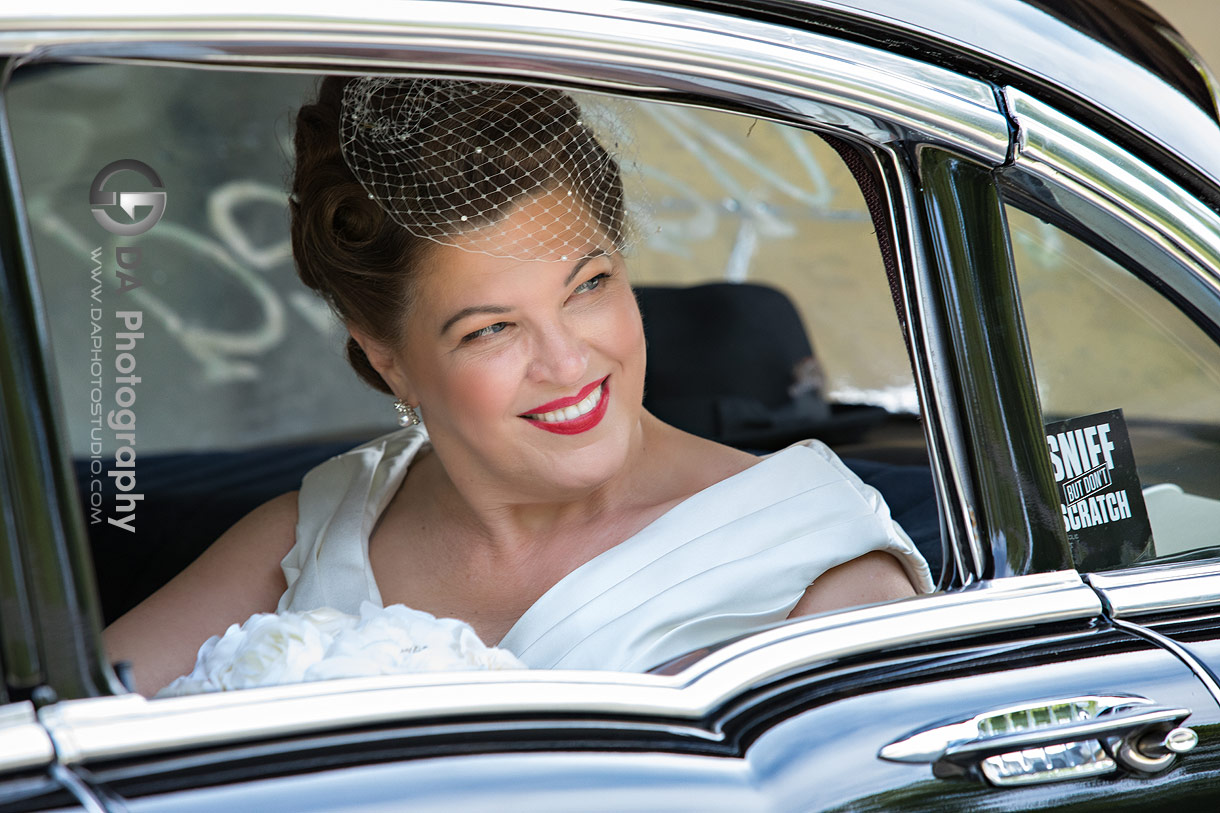 Photo of a bride in vintage Chevrolet '57