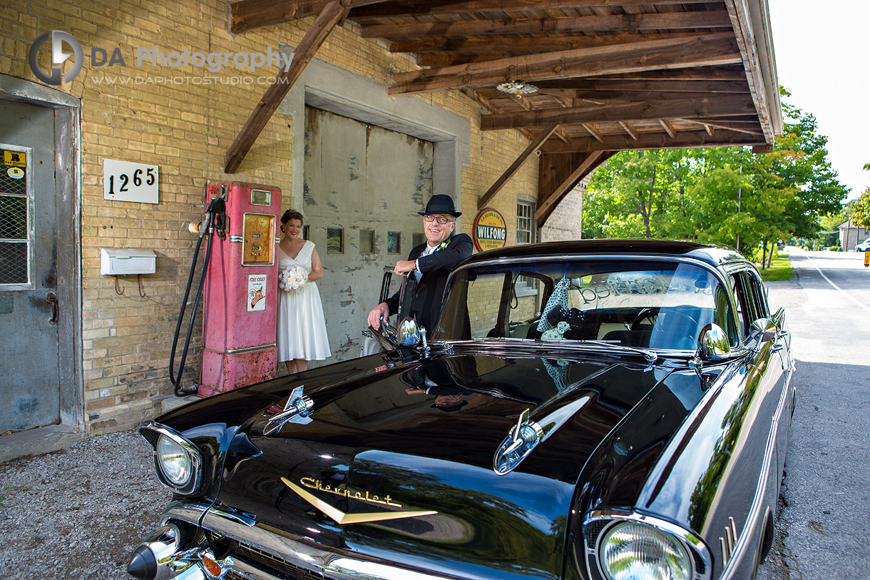 Bride and Groom with vintage car at Wilfong and Son LTD