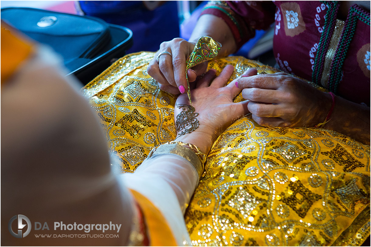 Henna application on Mehndi party