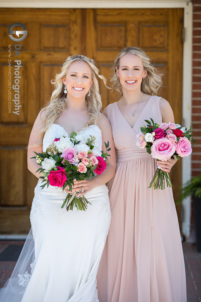 Bride and Bridesmaid at St. Therese Catholic Parish in Courtice