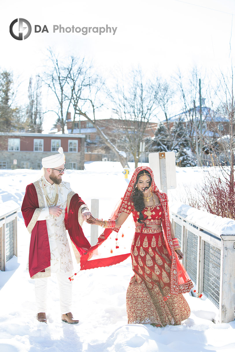 Bride and groom with Indian wedding outfits at Oakbank Pond Park