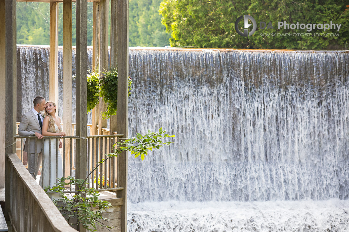 Bride and Groom by the waterfall at Millcroft Inn and Spa