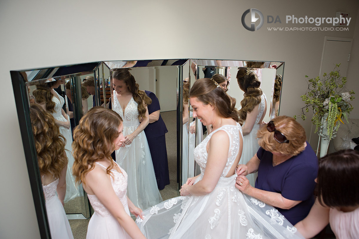 Bride getting ready with her mom and daughter at Waterstone Estates
