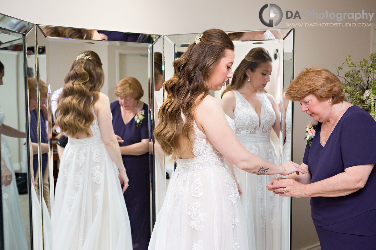 Photo of Bride getting ready with her mom at Waterstone Estates