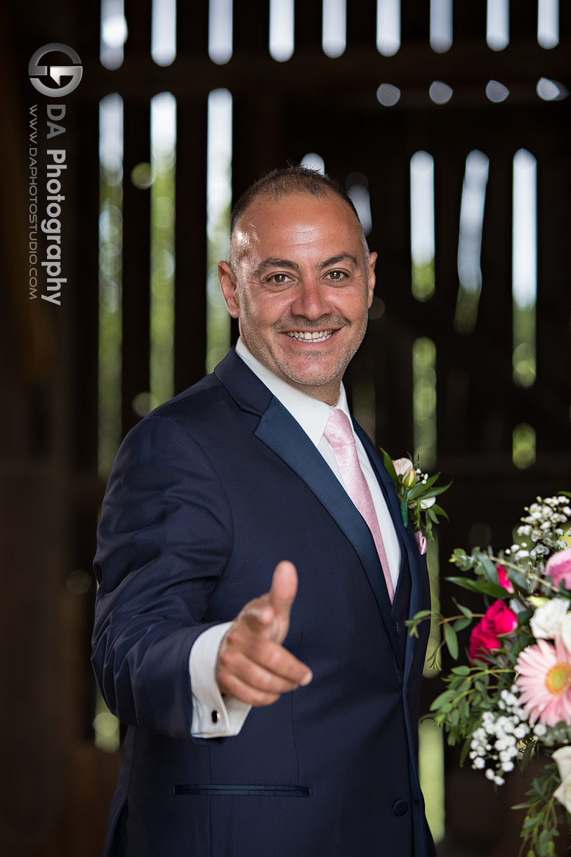 Groom in a barn wedding in Newmarket