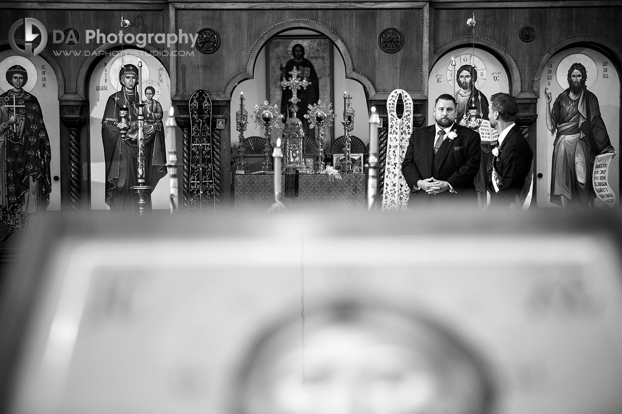 Groom in expectation of his bride in a church