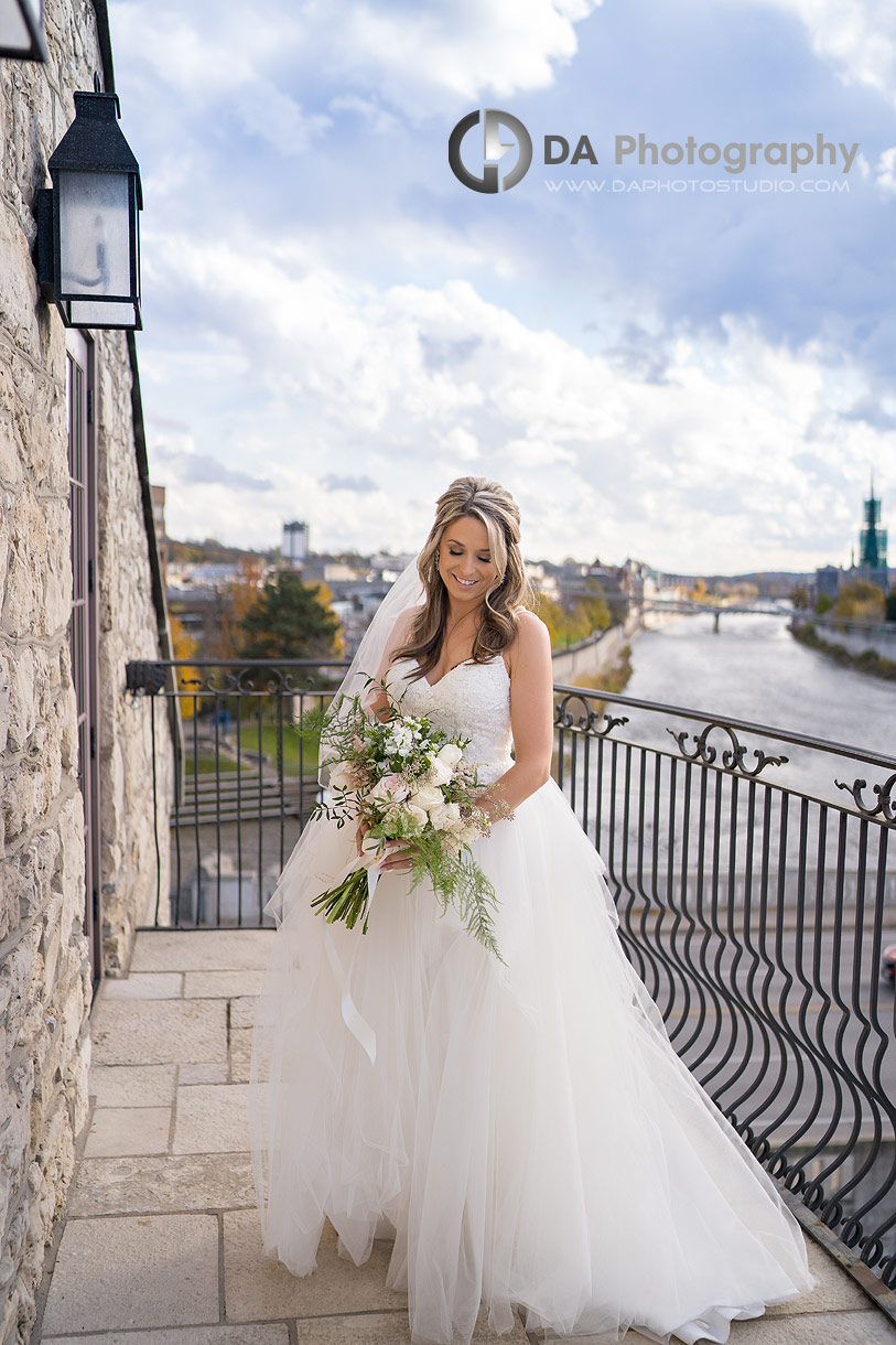 Bride at the balcony at Cambridge Mill