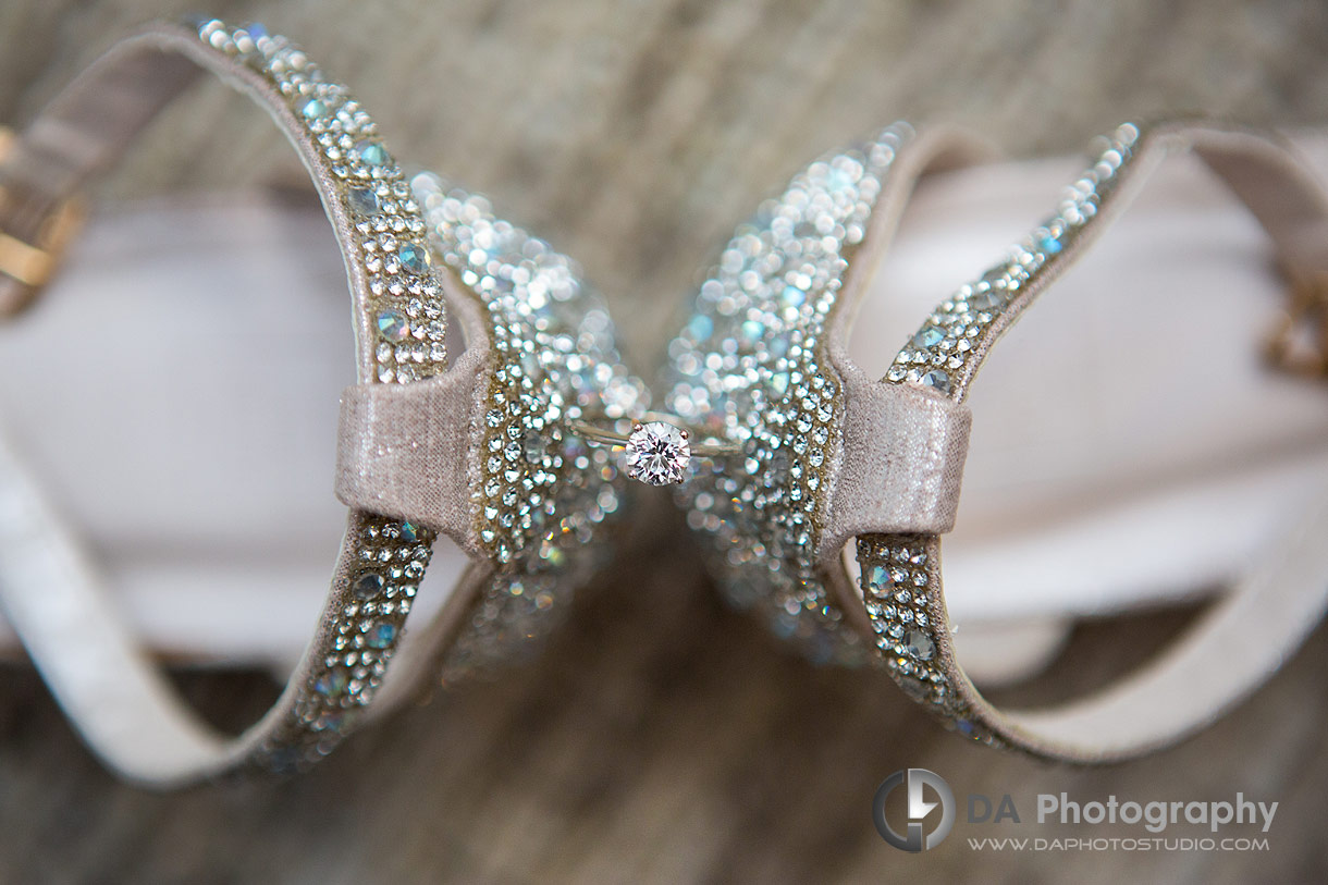 Wedding Ring in between shoes at White Oaks Resort and Spa