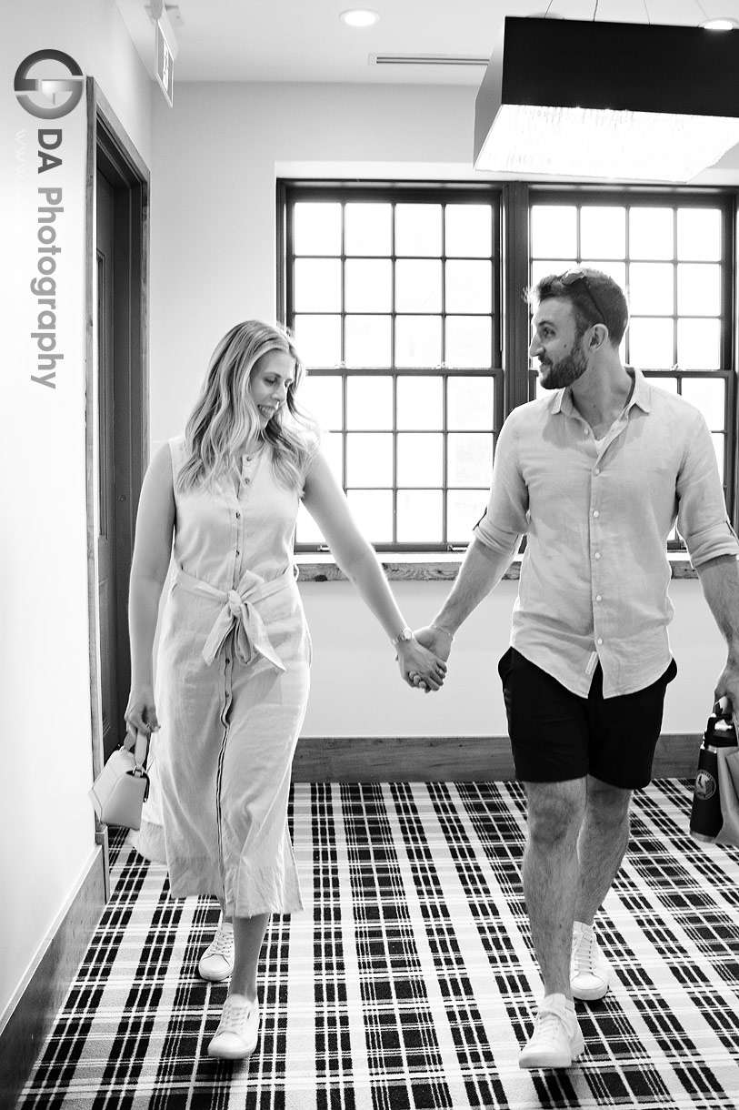 Photo of a Couple walking in the corridor at Elora Mill Hotel and Spa