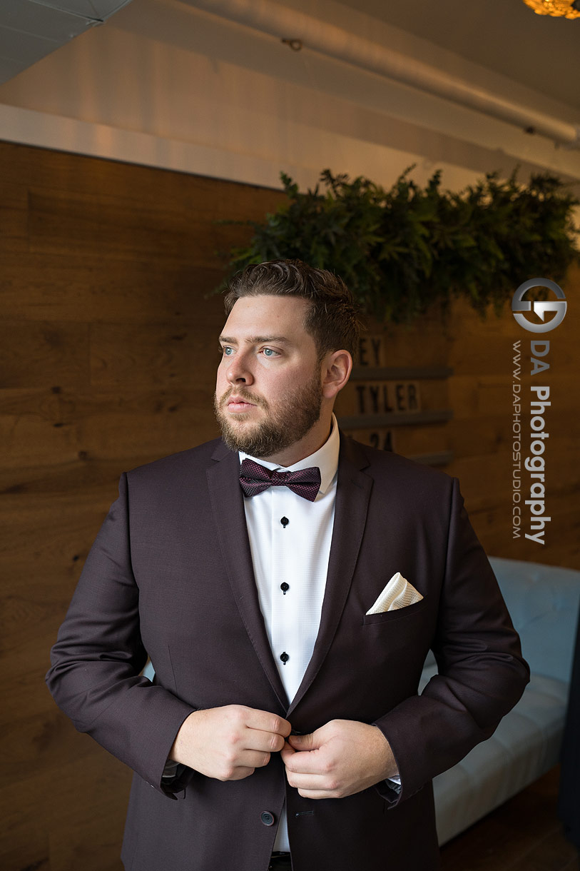 Groom at Timber Barn in Something Blue Lounge