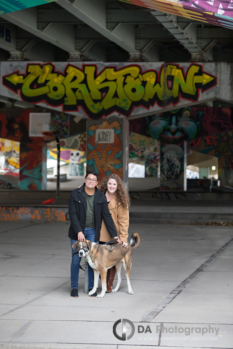Couple with their dog at Underpass Park in Toronto