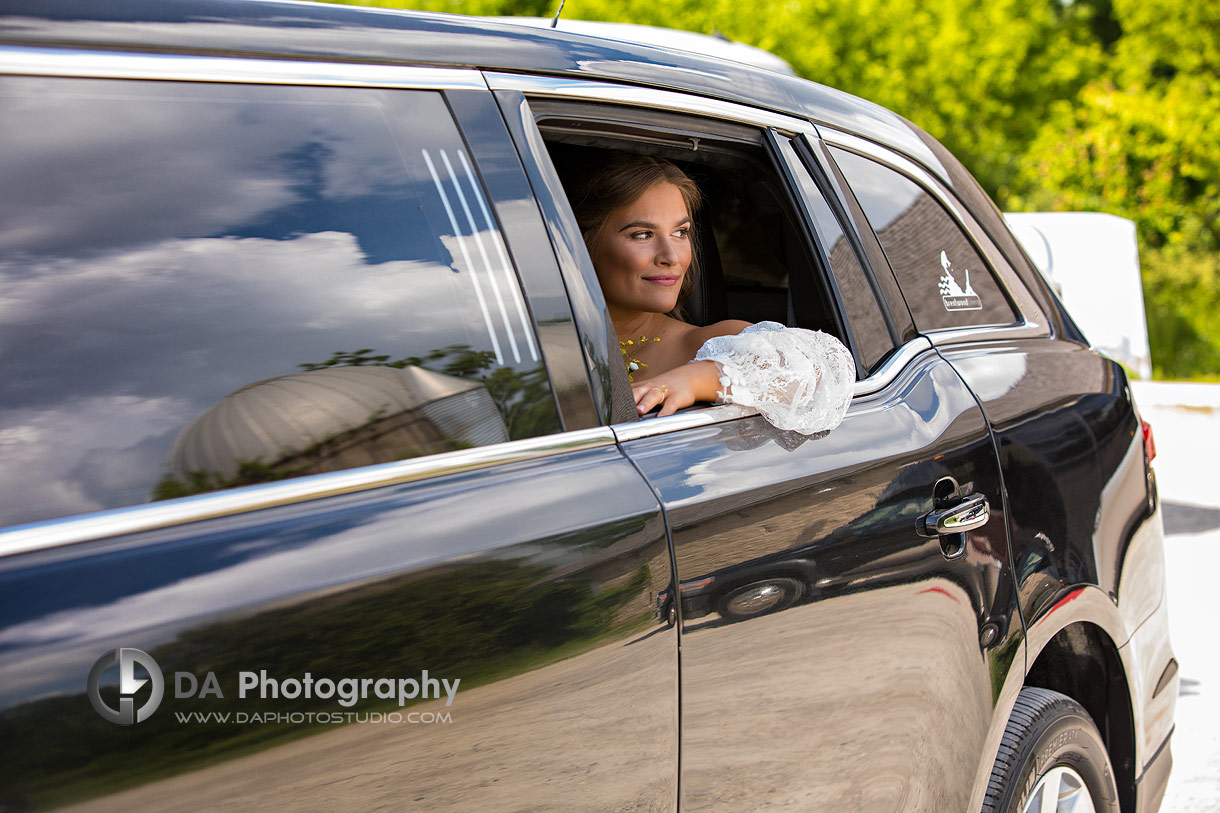 Bride in Cambridge in the limo