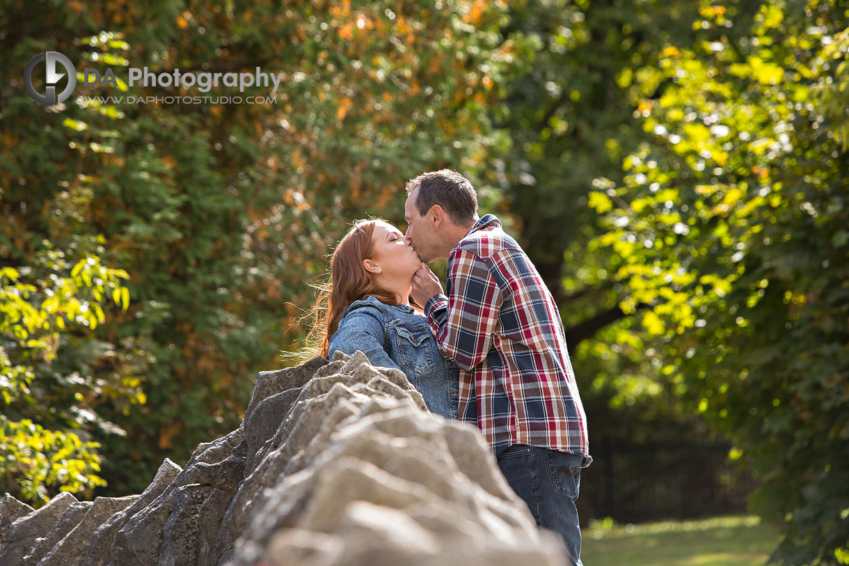 Intimate engagement photos by a waterfalls