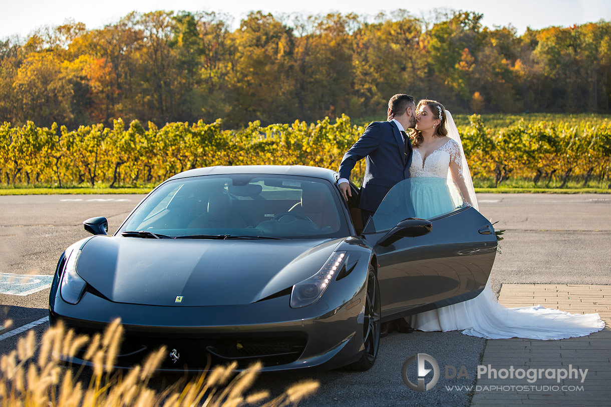 Photo of a Wedding Couple with their Ferrari at Vineland Estates Winery