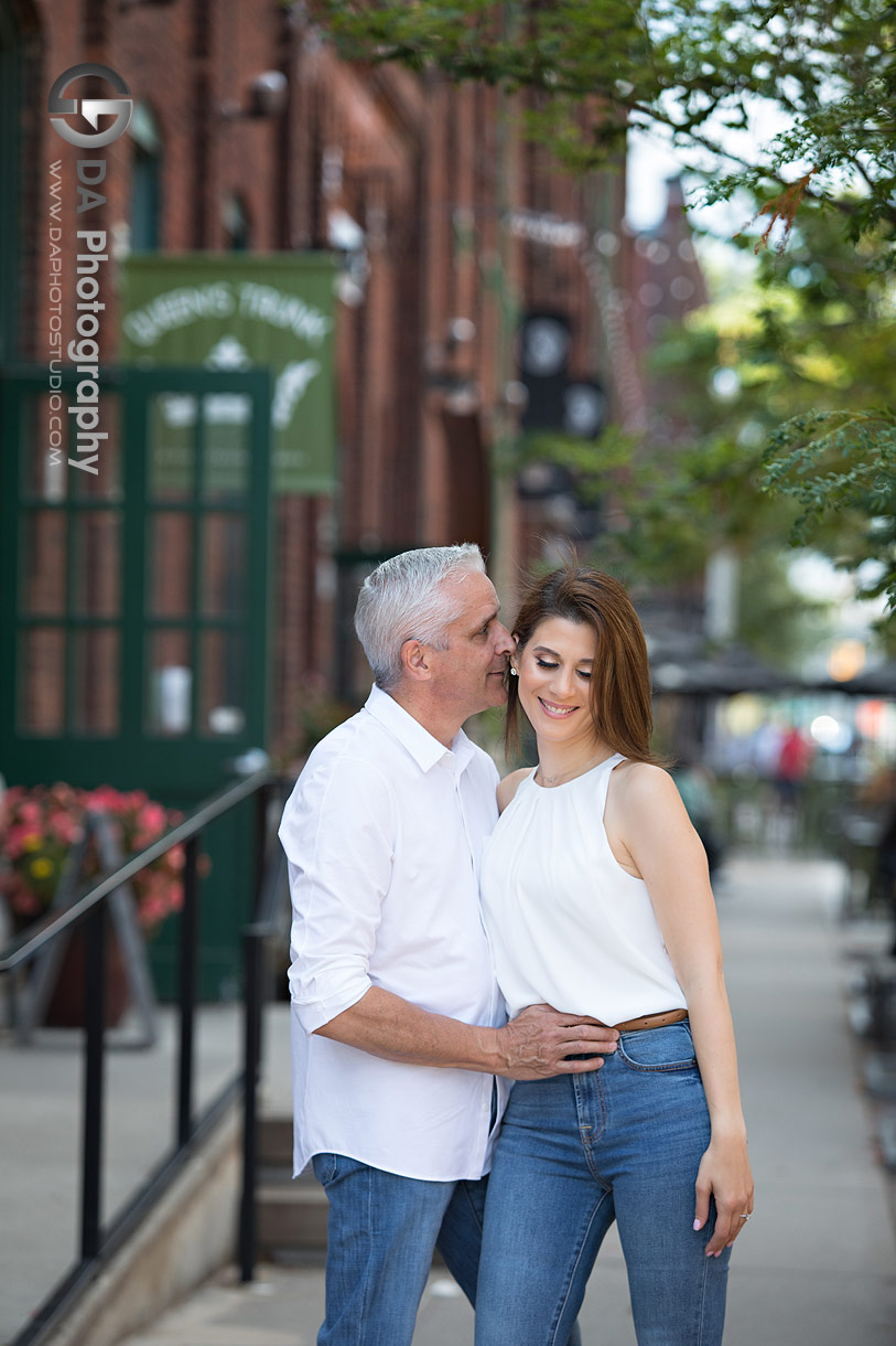 Intimate engagement photo at Distillery District