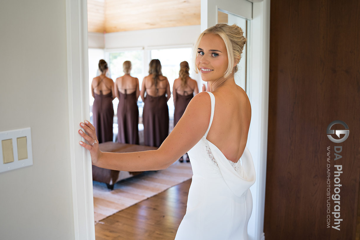 Bride reveal of her dress with her bridesmaids 