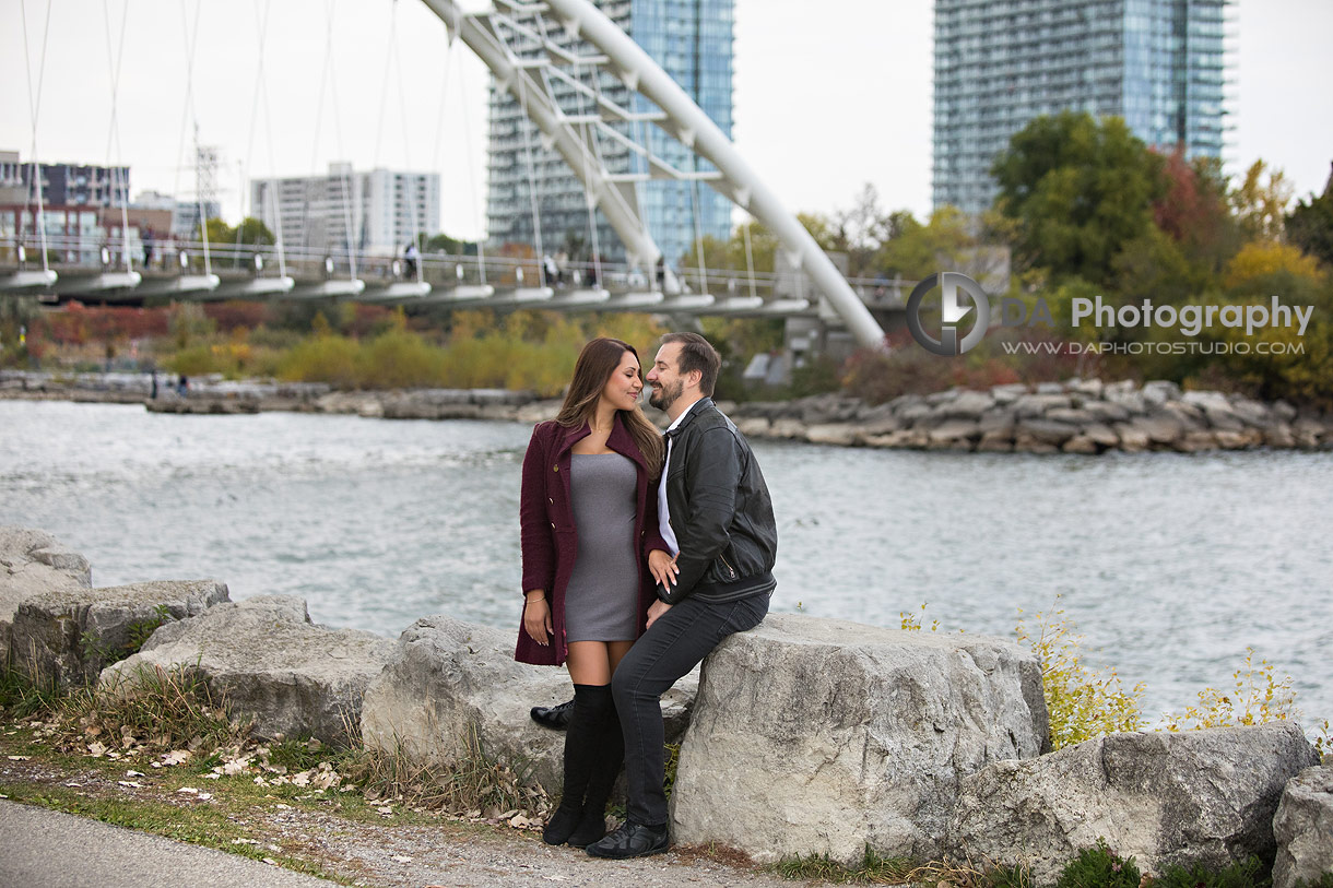 Intimate engagement photo at Humber Bay Arch Bridge in Toronto