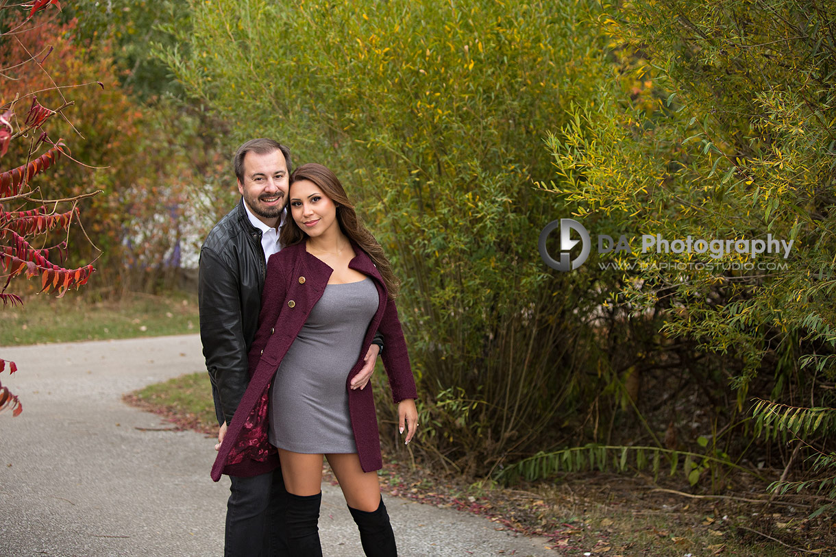 Intimate engagement photos under Humber Bay Arch Bridge