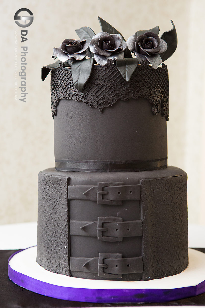 Photo of a black wedding cake on a Gothic wedding