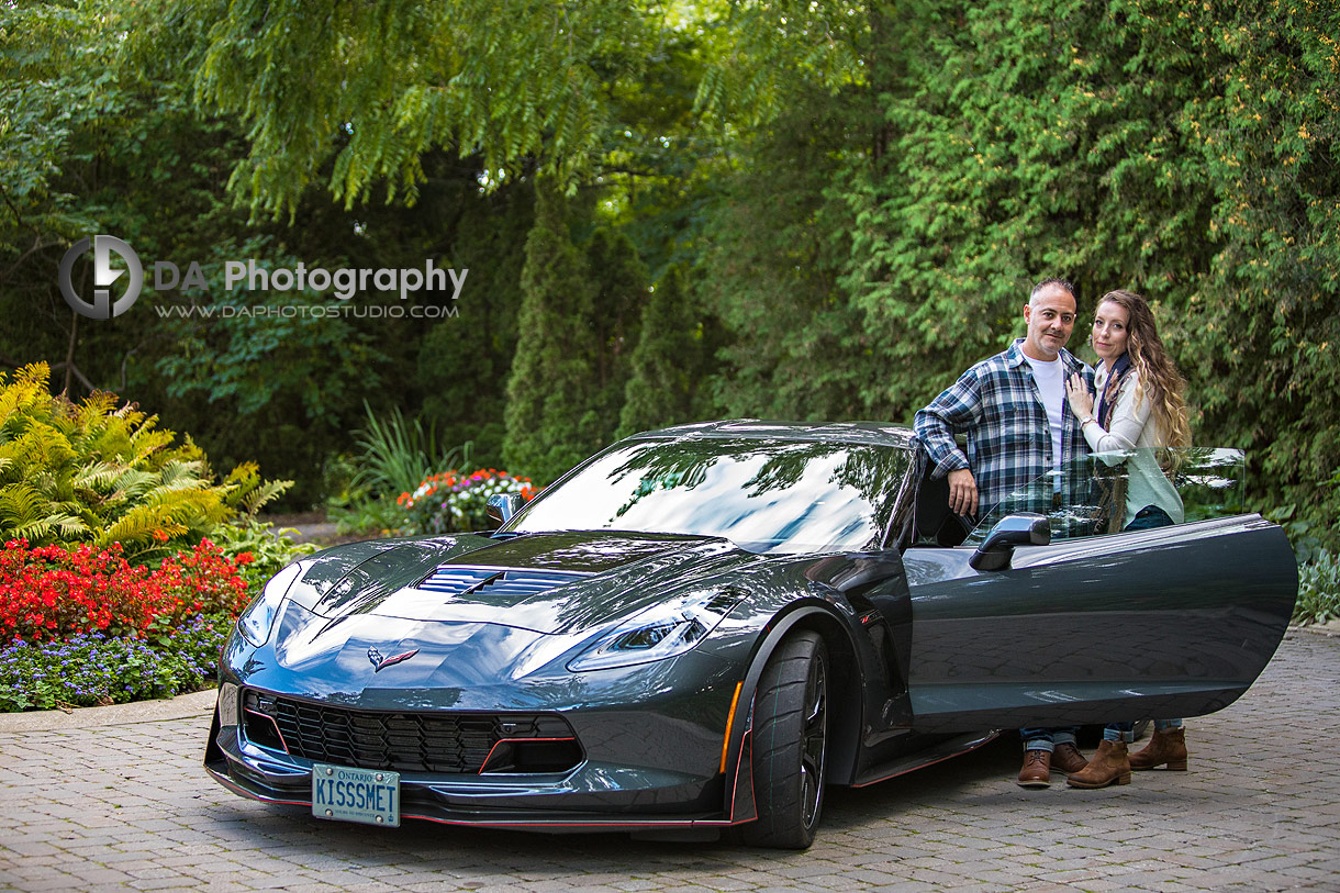 Engaged couple stands by their Corvette Engaged couple stands by their Corvette