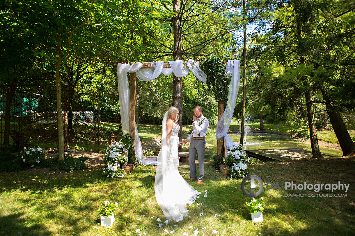 First Look photo of a Bride and Groom at Farm wedding
