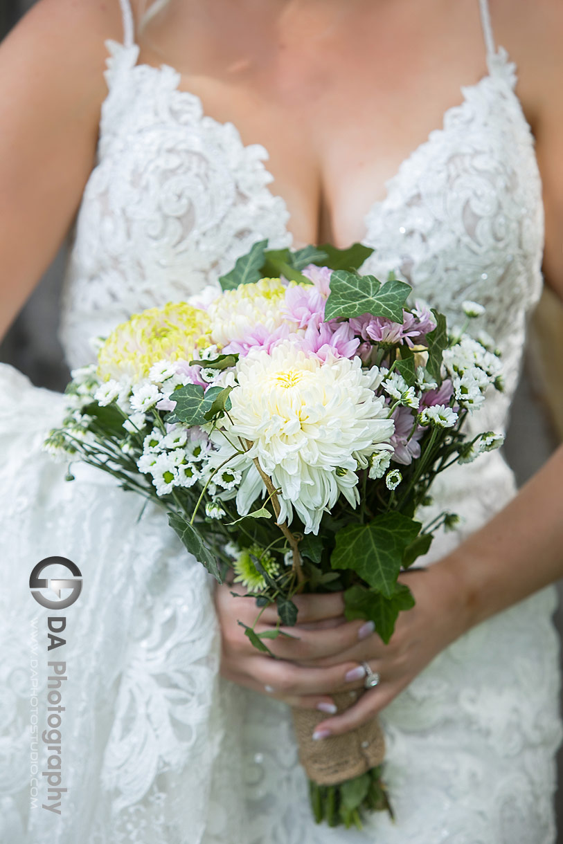 Photo of a bride holding her flowers on a wedding day