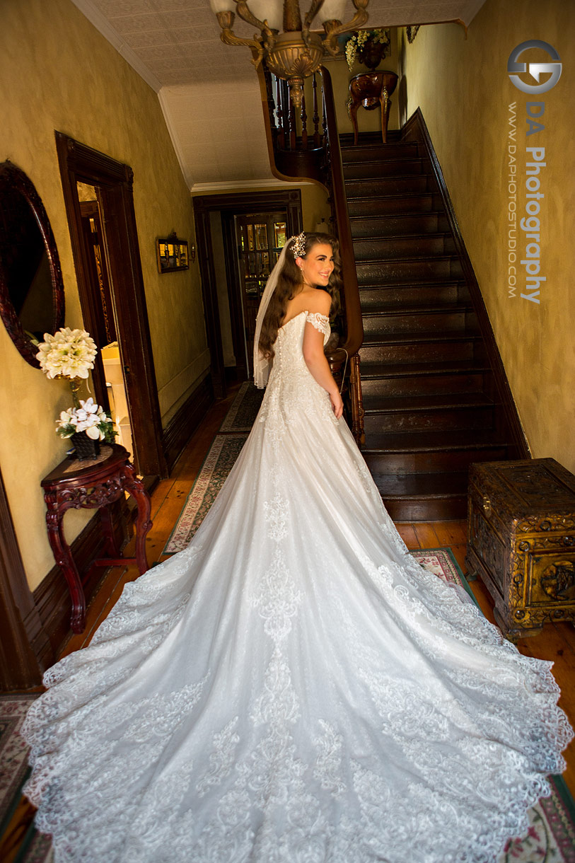 Bride in boho-style wedding dress posing at NithRidge in Ayr
