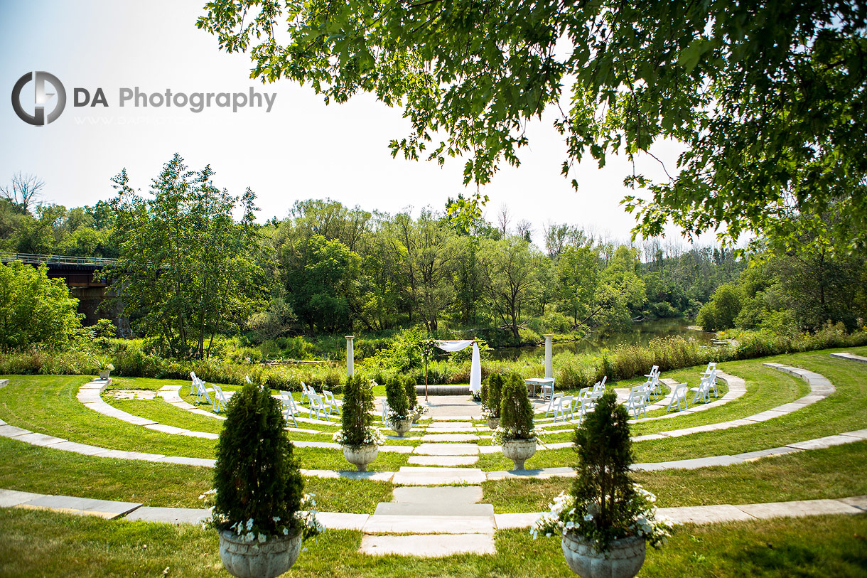 Outdoor boho wedding ceremony by Nith River amphitheatre