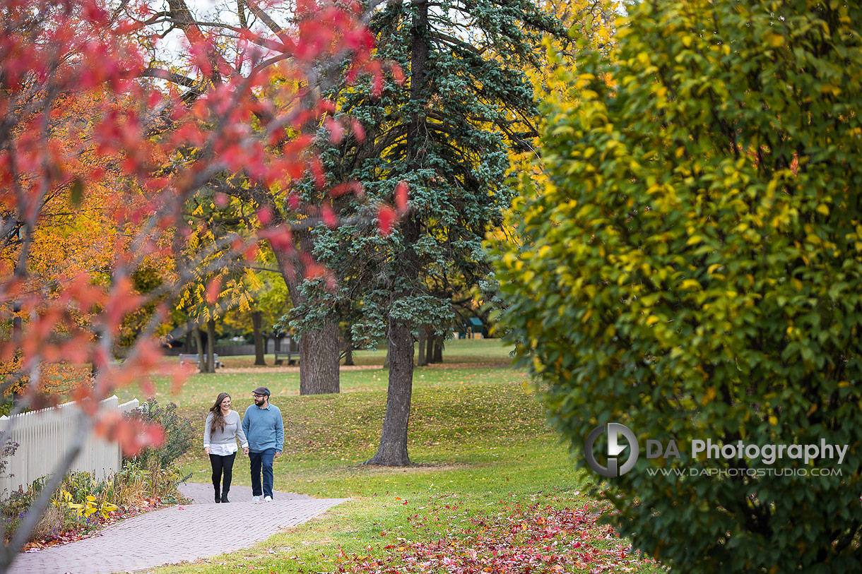 Relaxed couple enjoying final moments of engagement session at Dundurn Castle