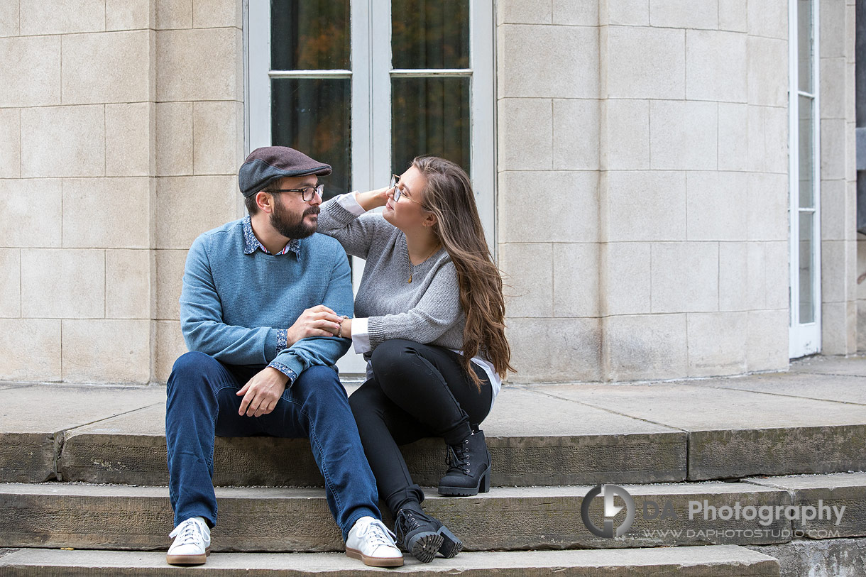 Relaxed engagement photo captured in soft overcast light at Dundurn Castle