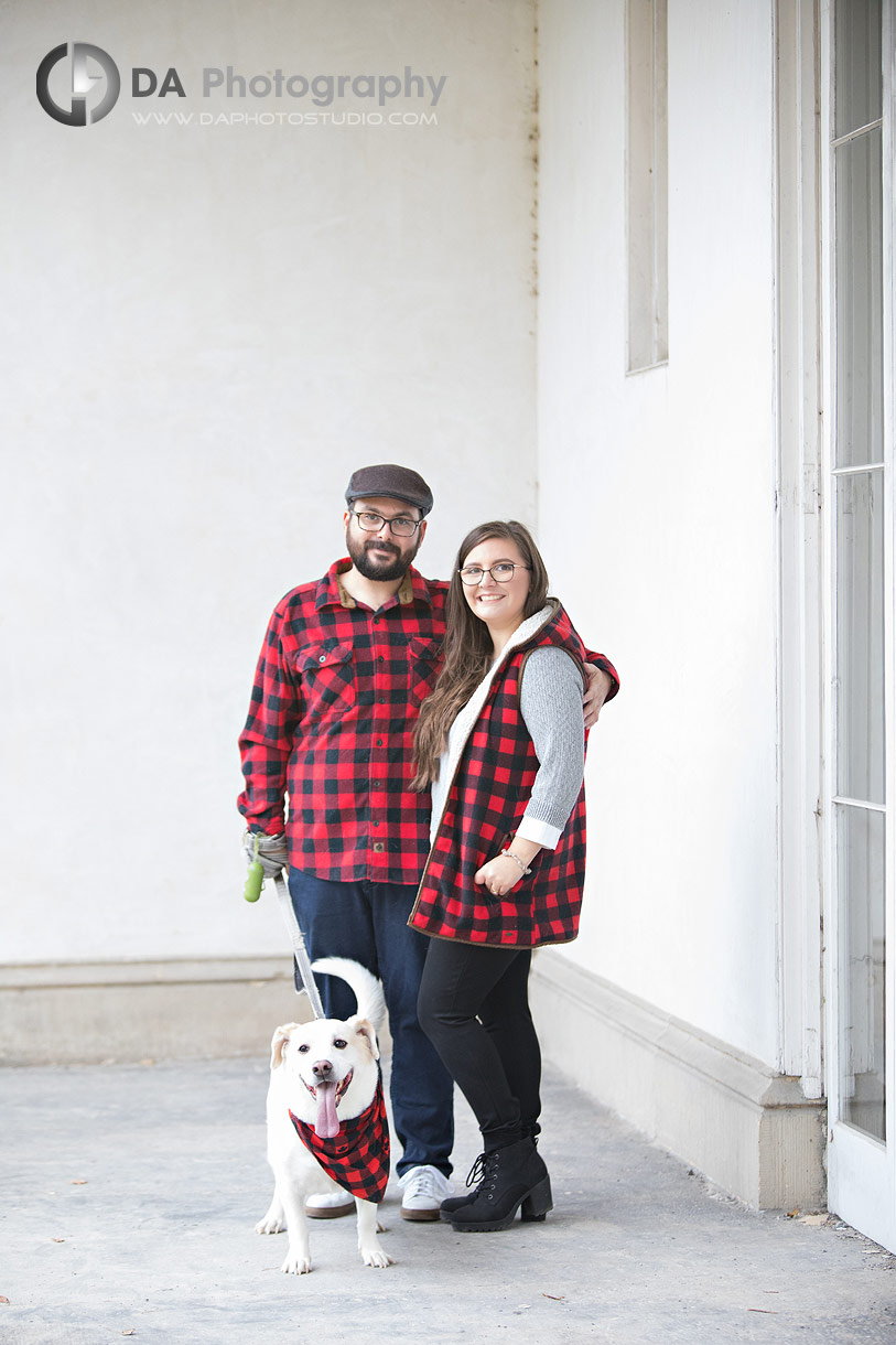 Minimalist engagement portrait using Dundurn Castle wall as backdrop