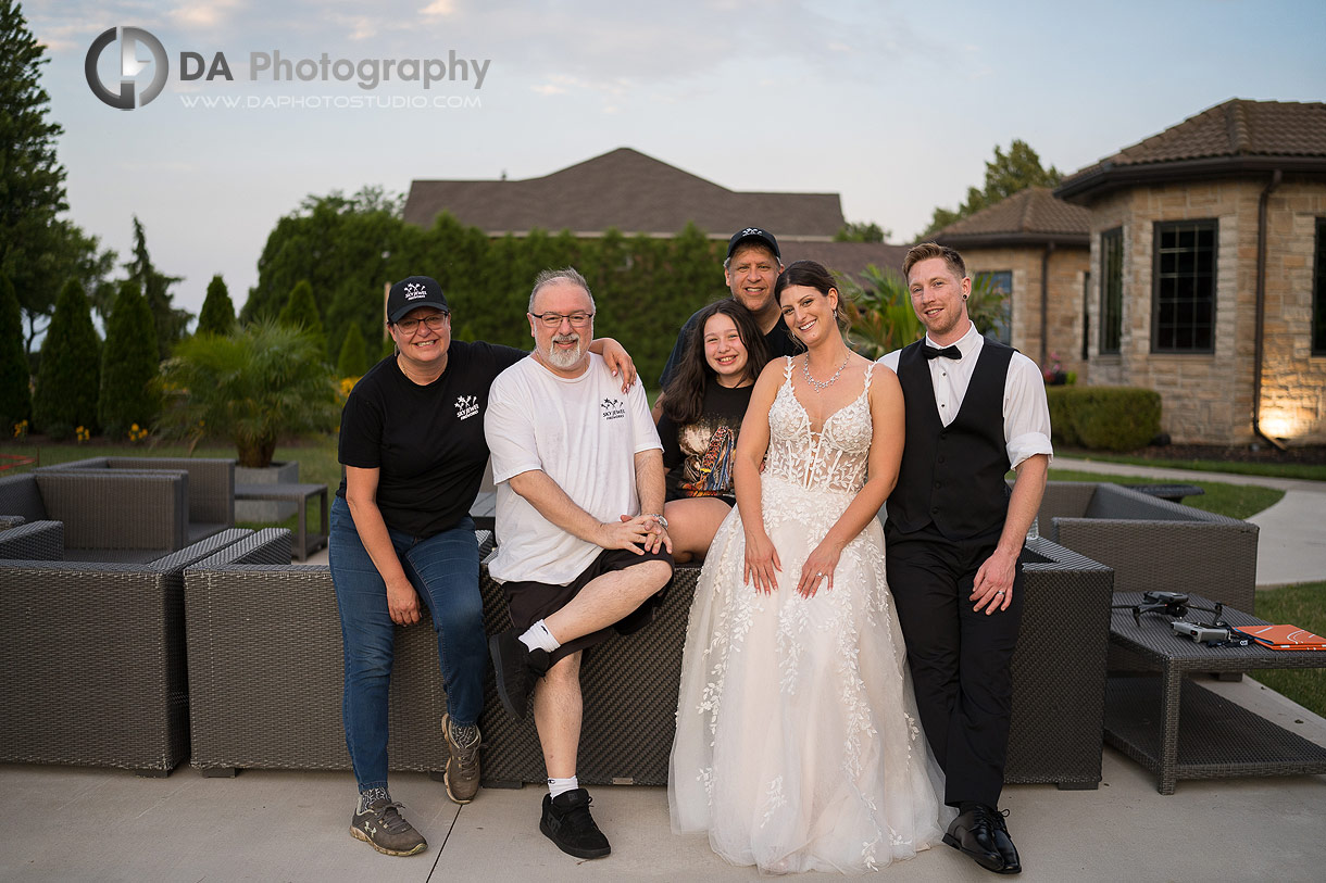 Candid photo of a bride with the pyrotechnic staff from Sky Jewel