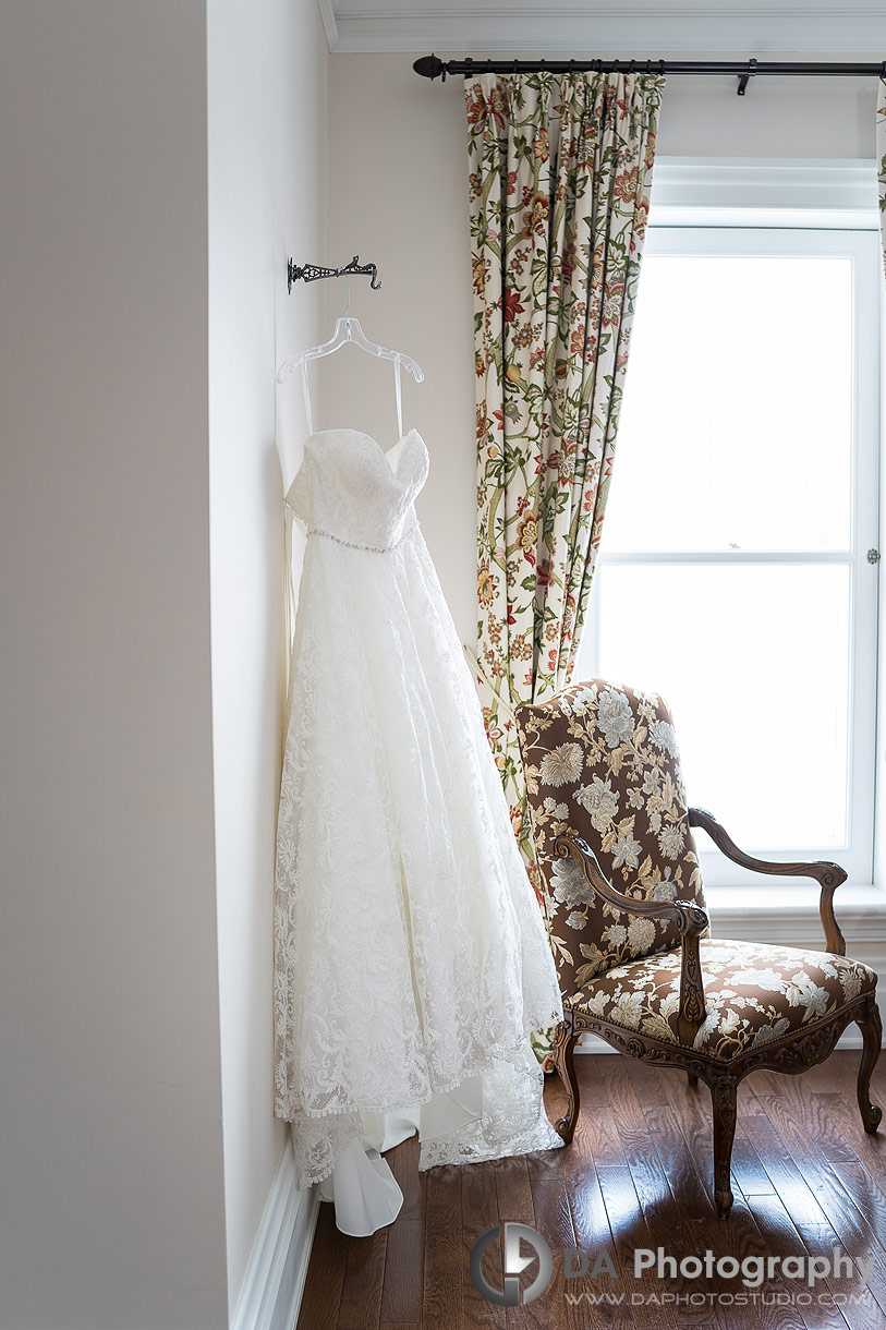 Photo of af a hanged wedding dress at Alderlea