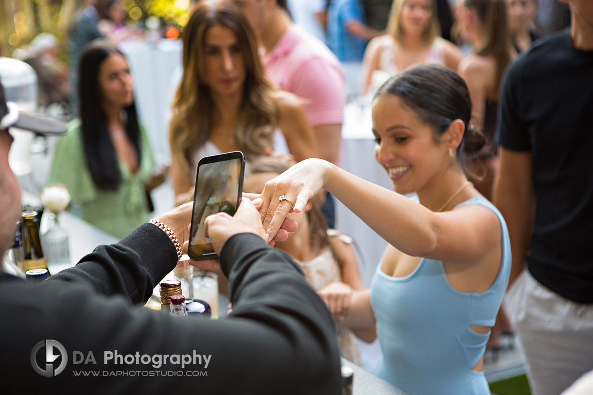Bride to be showing her engagement ring