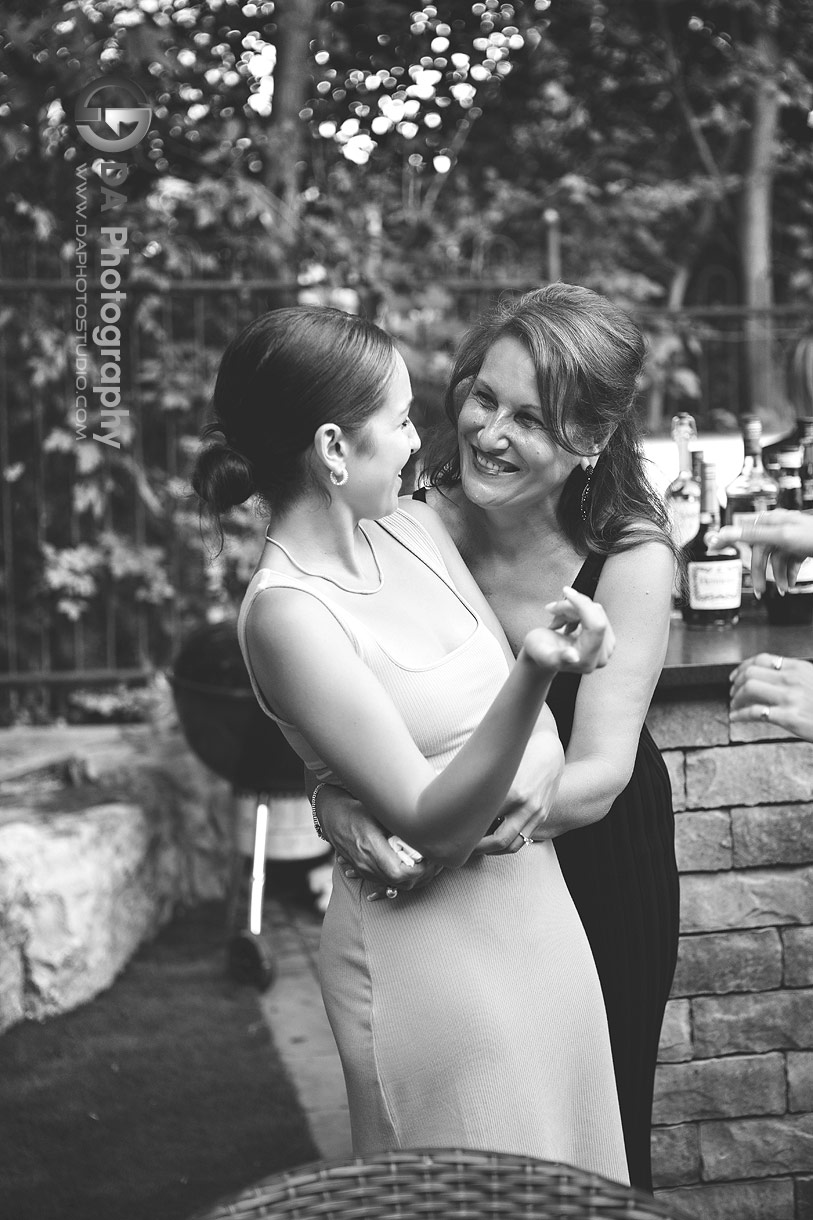Photo of Bride to-be with her mom after surprise proposal
