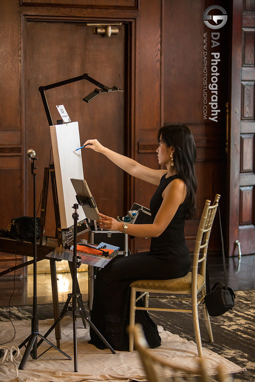 Photo of a Live Painter, Eunjin starting her canvas