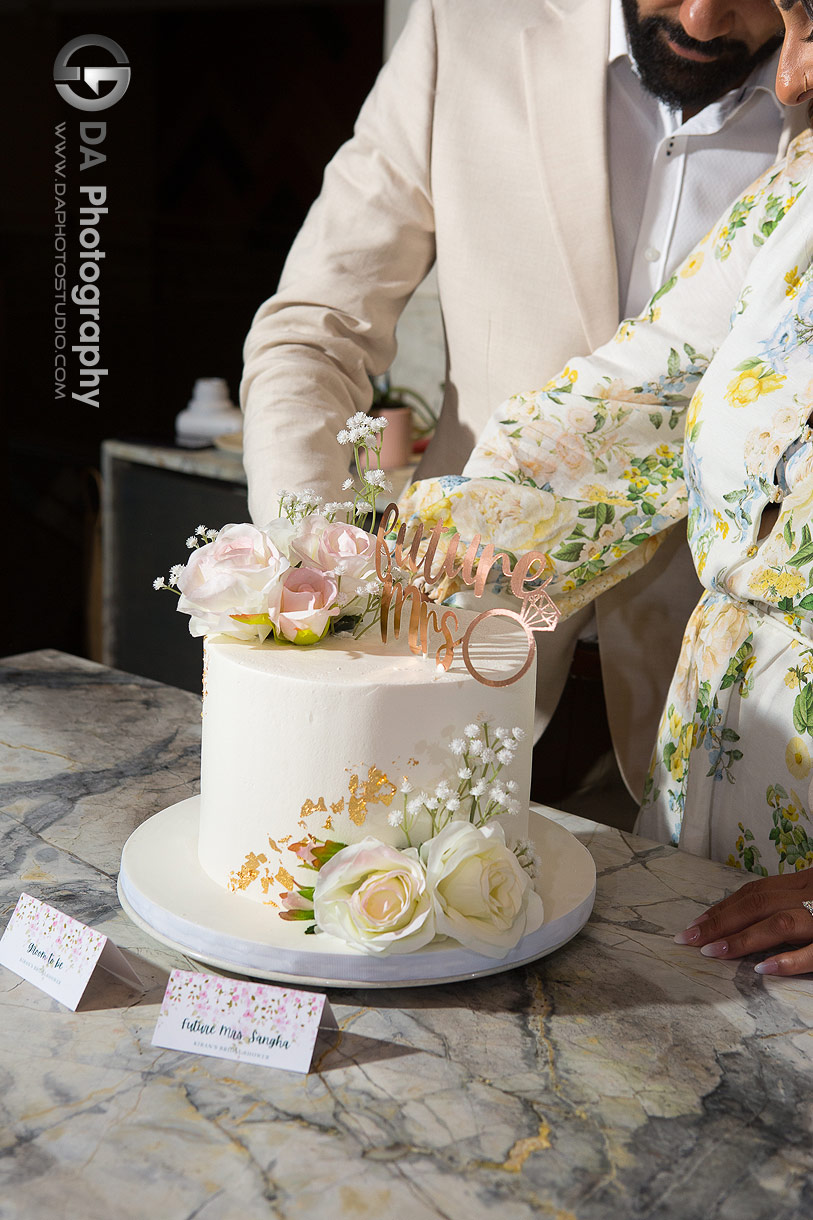 Cake cutting at an Intimate Bridal Shower in Toronto