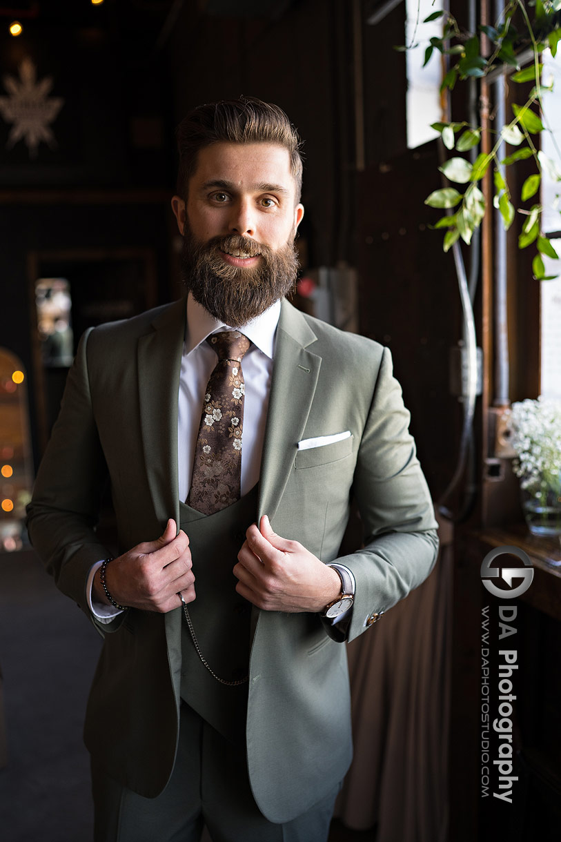 Groom getting ready photos at Rainhard Brewing Co