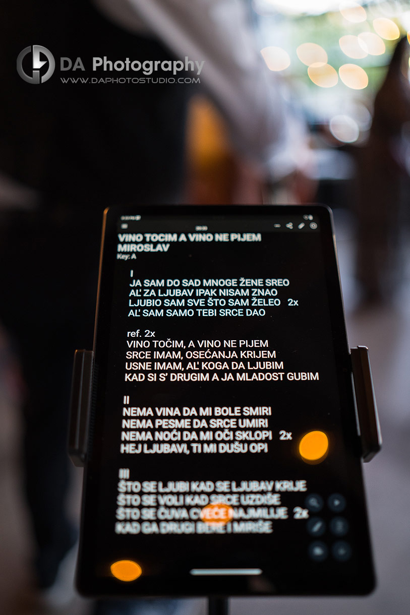Close up phot of a iPad with Serbian song lyrics