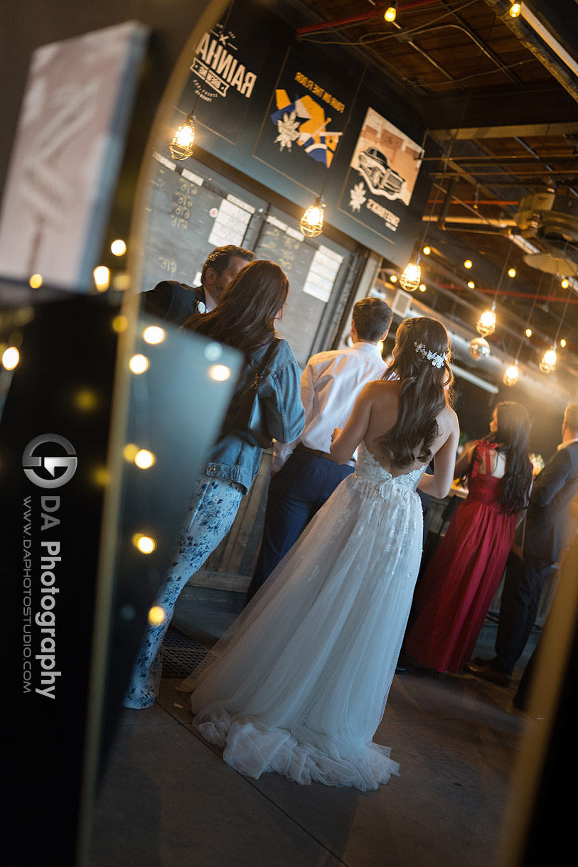 Reflection of a bride in a mirror at Rainhard Brewing Co.