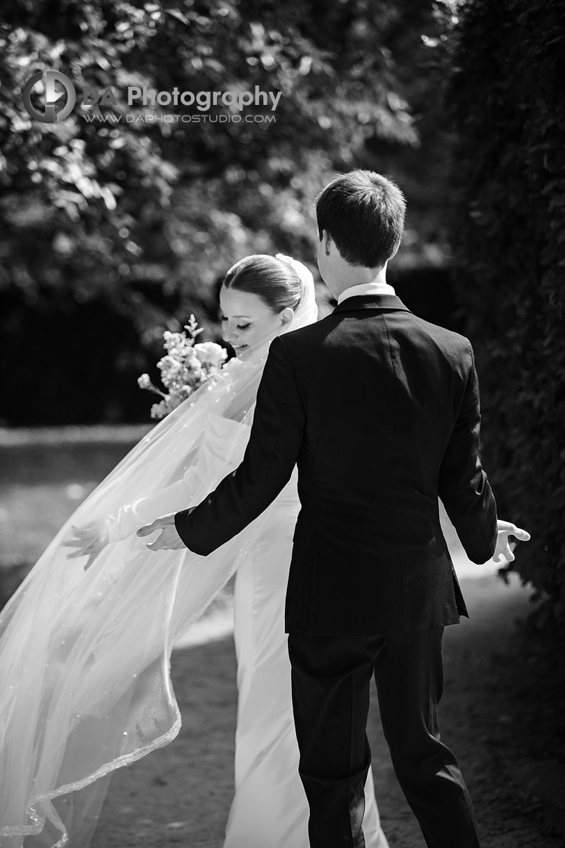 Photo of a Bride showing off her dress after the first look photos