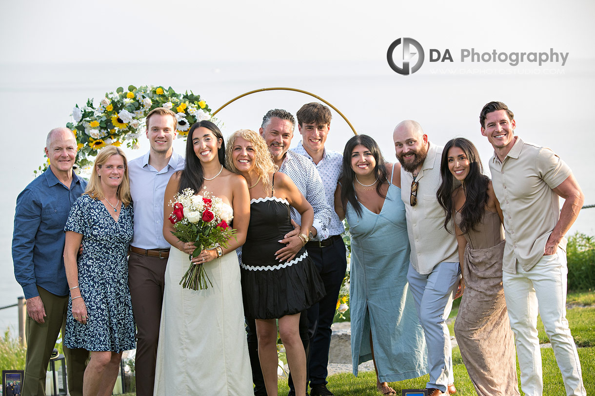 Group Photo of a family after surprise proposal by Lake Erie
