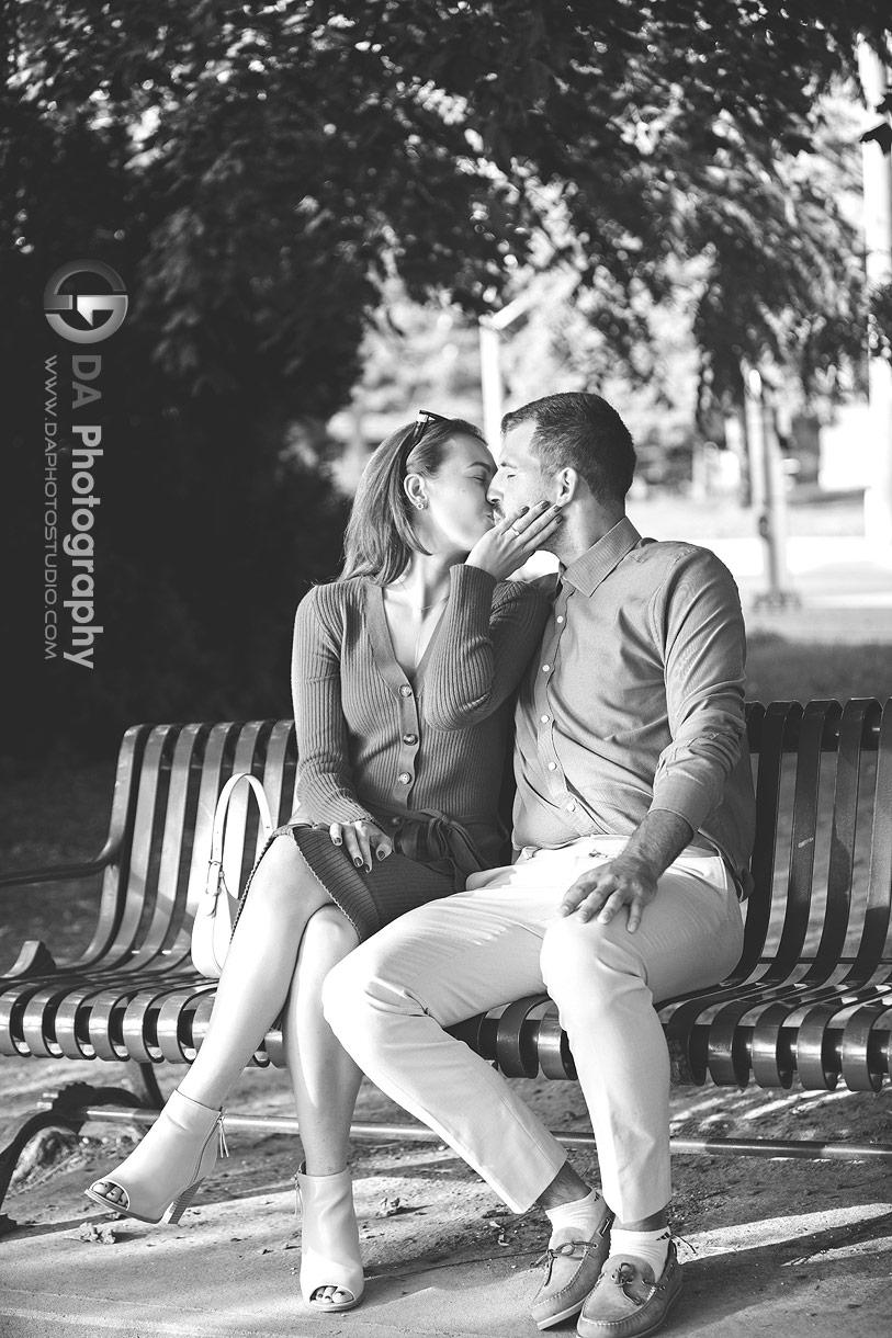 Intimate proposal photos at the bench by the lake