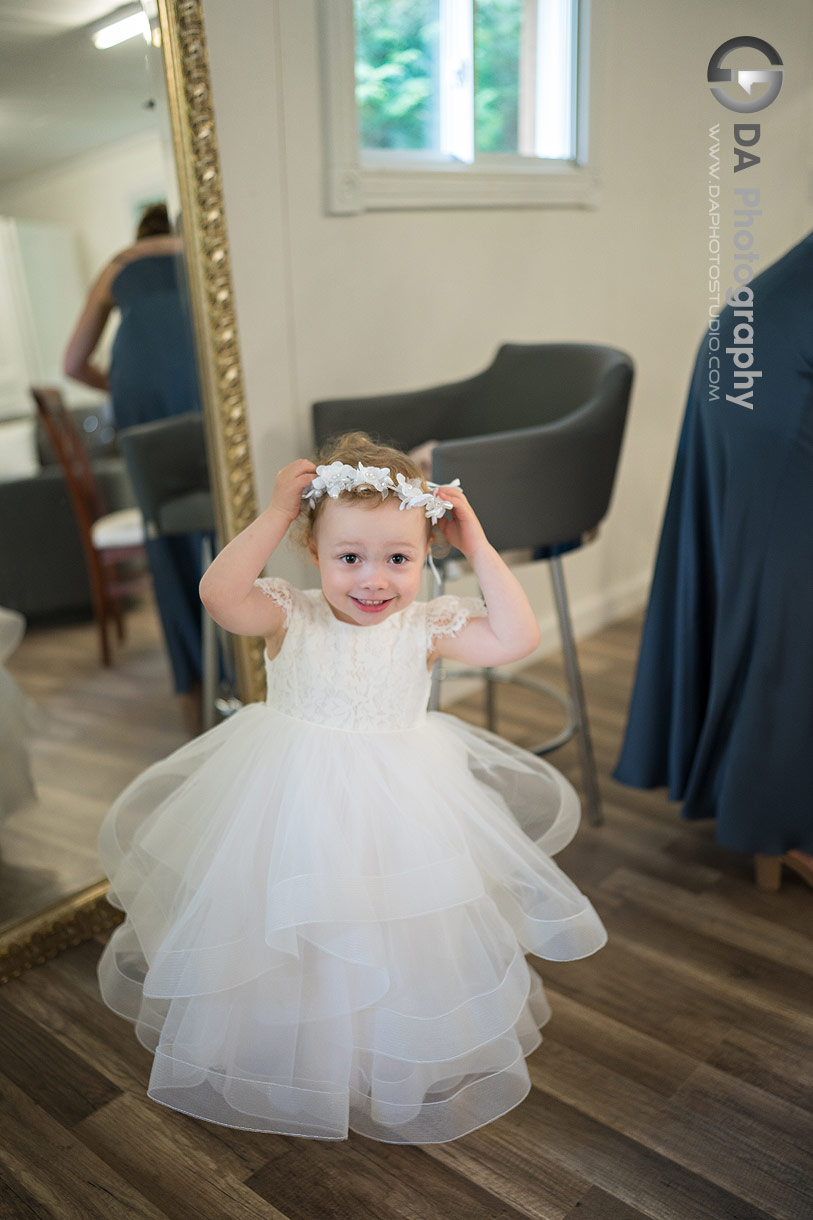 Flower girl fixing her head piece Flower girl fixing her head piece