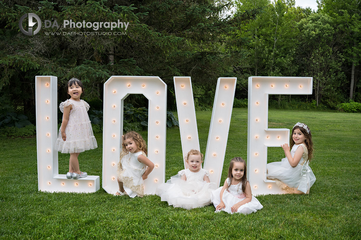 Photo of a flower girls by LOVE letters display at CJ Country Events Wedding Photo of a flower girls by LOVE letters display at CJ Country Events Wedding