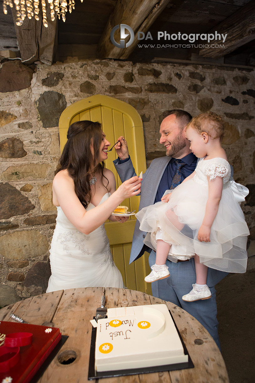 Photo of a Young family cake cutting Photo of a Young family cake cutting