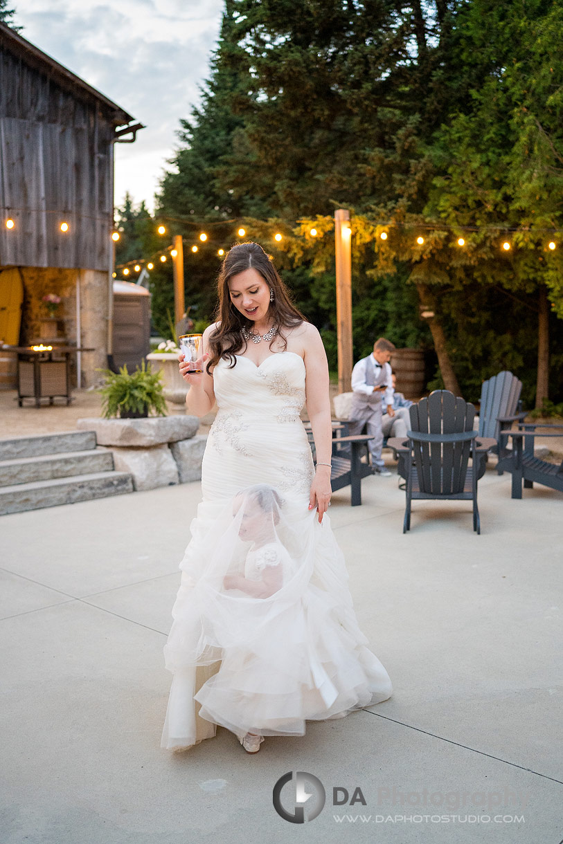 Bride with her daughter on a Rockwood Outdoor Wedding Bride with her daughter on a Rockwood Outdoor Wedding